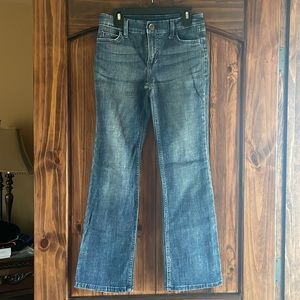 Girls, size 12 Bootcut Wrangler jeans.  27” inseam.